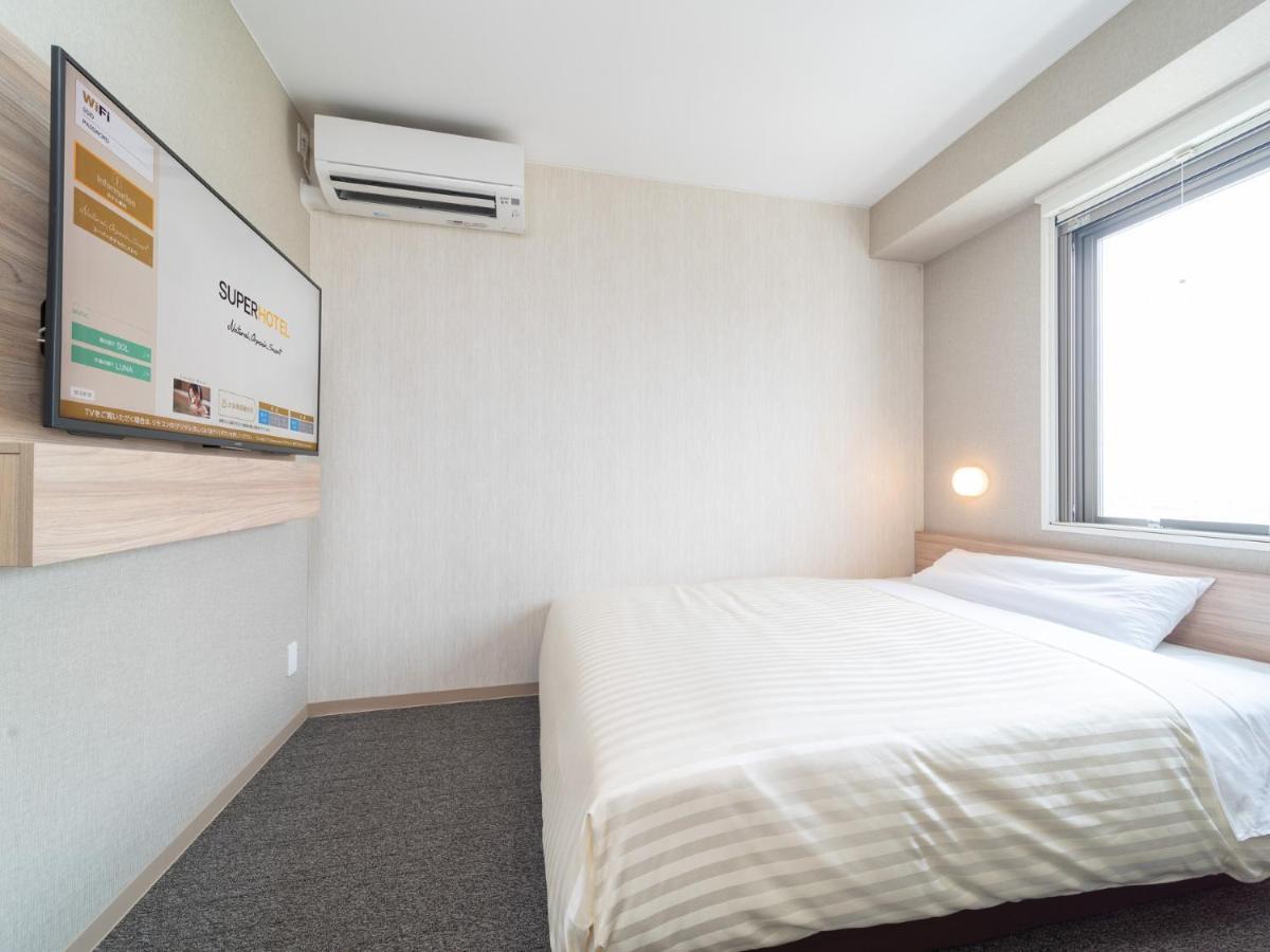 Super Hotel Iyo Saijo Bagian luar foto